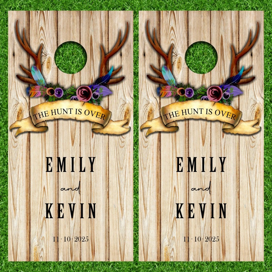 Customize Your Name on this Wedding Monogram Date Established The Hunt Is Over Deer Antlers Light Wood Background Cornhole Wraps