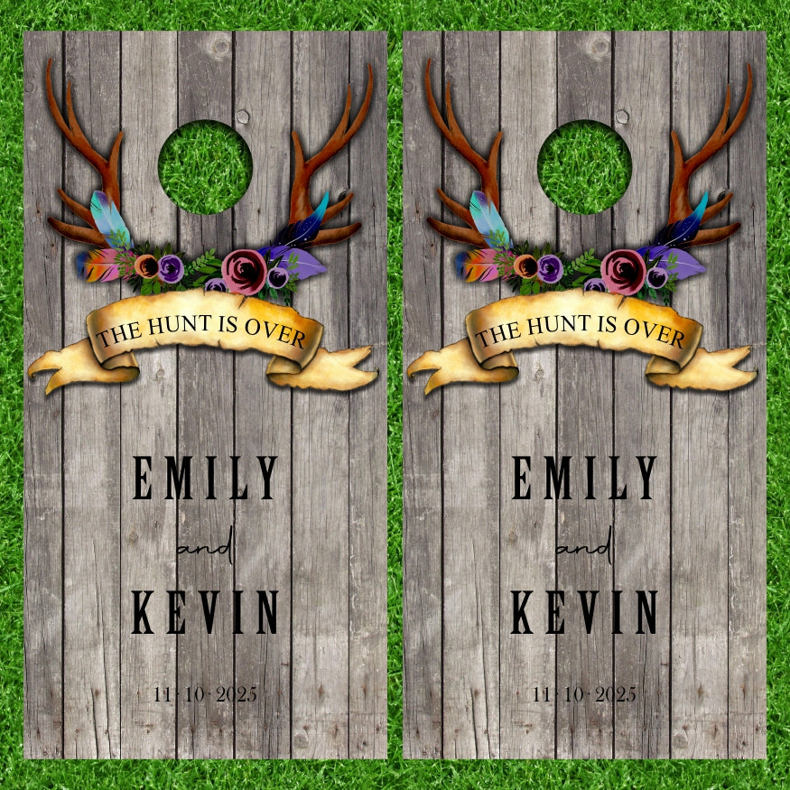 Customize Your Name on this Wedding Monogram Date Established The Hunt Is Over Deer Antlers Gray Wood Background Cornhole Wraps