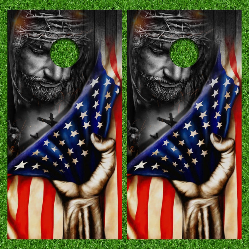 Strong Hand Pulling American Flag over Jesus Cornhole Wraps