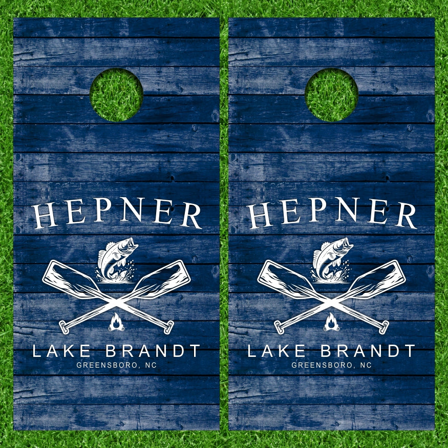 Lake Brandt Paddles Fire Fish with Weathered Wood Background Cornhole Wraps